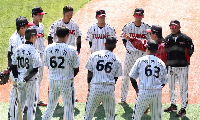 LG Twins team players practice ahead of their intra-team game to be broadcasted online for their fans at a empty Jamshil baseball stadium as South Koreans take measures to protect themselves against the spread of coronavirus (COVID-19) on April 05, 2020 in Seoul, South Korea. South Korea has called for expanded public participation in social distancing, as the country witnesses a wave of community spread and imported infections leading to a resurgence in new cases of COVID-19. According to the Korea Center for Disease Control and Prevention on Sunday, 81 new cases were reported. The total number of infections in the nation tallies at 10,237. (Photo by Chung Sung-Jun/Getty Images)