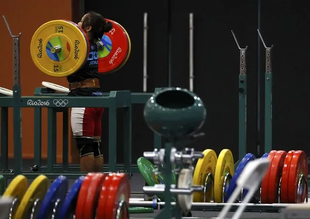 2016 Rio Olympics, Weightlifting, Women's Training, Riocentro, Rio de Janeiro, Brazil on July 27, 2016. An  athlete of Philippines practices. (Photo by Stefan Wermuth/Reuters)