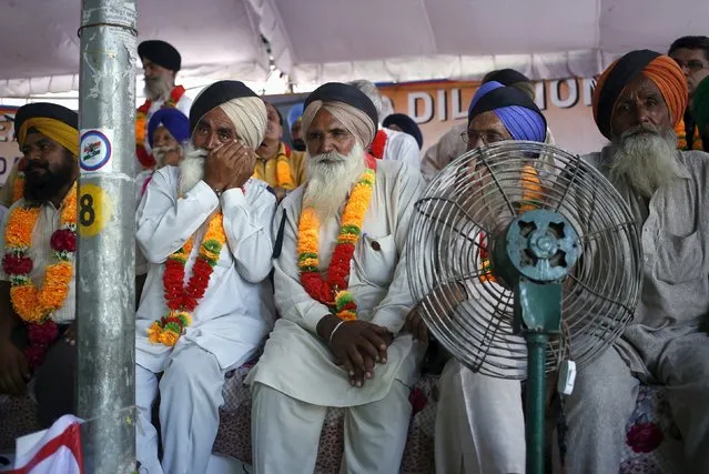Members of the Indian Ex Servicemen Movement take part in a sit-in protest in New Delhi, India, September 5, 2015. The Indian government approved a long-awaited programme to equalise pension payments for retired military personnel despite it being a “huge fiscal burden”, Defence Minister Manohar Parrikar said on Saturday. (Photo by Anindito Mukherjee/Reuters)