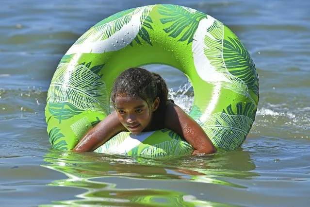 Amaya Nears, 10, of Oakley, swims in the water on Labor Day in Benicia, Calif., on Monday, September 5, 2022. The Bay Area is experiencing an excessive heat warning as temperatures soar above 104 degrees in the East Bay. (Photo by Jose Carlos Fajardo/Bay Area News Group via AP Photo)