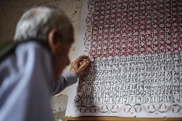 77 year-old Palestinian Samih Kaeden, a father of Abdulrauf Kaeden who has been detained for 17 years in Israeli prison, looks forward to reaching a day he will meet his son in Rafah, Gaza on July 09, 2020. Samih Kaeden hanging a calendar which shows the number of days left to meet his son, crosses everyday as 120 days left to be released from the prison. He said the mother of Abdulrauf Kaeden died before meeting and hugging her son in 2018. (Photo by Abed Zagout/Anadolu Agency via Getty Images)