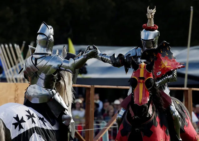 Australian jousting knight Cliff Marisma (L) and countryman Philip Leitch acknowledge each other on horseback during the final round of the jousting competition the St Ives Medieval Fair in Sydney, one of the largest of its kind in Australia, September 25, 2016. (Photo by Jason Reed/Reuters)