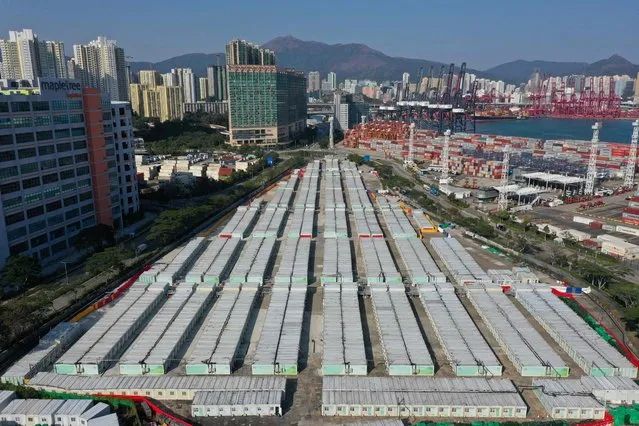 An aerial view shows Tsing Yi Covid Isolation camp in Hong Kong on January 24, 2023. Seven Hong Kong quarantine facilities including Tsing Yi, built by the government providing more than 40,000 beds are currently unoccupied. (Photo by Peter Parks/AFP Photo)