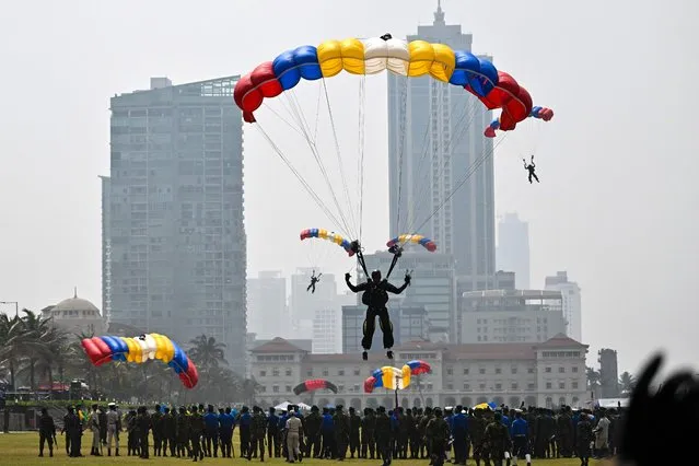 Sri Lankan army parachute troopers take part in Independence Day parade rehearsal in Colombo on January 29, 2023. (Photo by Ishara S. Kodikara/AFP Photo)