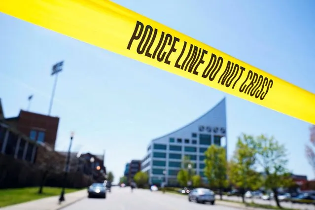 View of barricade tape as police deploy at the scene of a mass shooting outside an Old National Bank branch near Slugger Field baseball stadium in downtown Louisville, Kentucky, U.S. April, 10, 2023. (Photo by Jeffrey Dean/Reuters)