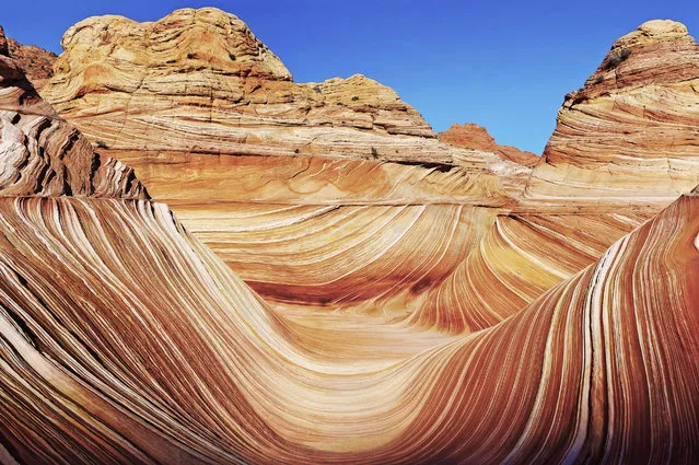 “The Wave”. I was one of the lucky few that have seen this amazing rock formation, only 20 permits are issued a day and there is an actual lottery to win the permit, 10 are issued online and 10 are issued at the Paria Canyon rangers station. This rock formation is Navajo Sandstone which has been created by the natural elements over eons. It is one of the most beautiful things that I have ever seen and I felt privileged that I had the chance to do so. Location: North Coyote Buttes, Arizona, USA. (Photo and caption by Miriam Perritt/National Geographic Traveler Photo Contest)