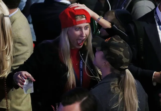 People in the crowd at Donald Trump's 2016 US presidential Election Night event watch results begin to come in at the New York Hilton Midtown in New York, New York, USA, 08 November 2016. Americans vote on Election Day to choose the 45th President of the United States of America to serve from 2017 through 2020. (Photo by Shawn Thew/EPA)