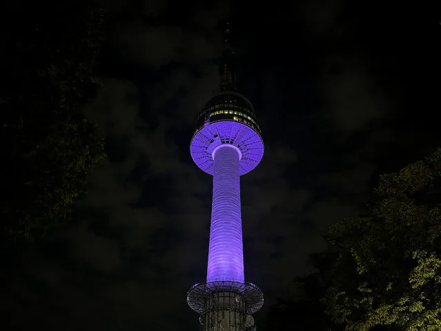 The N Seoul Tower, also known as Namsan Tower, lights up in purple to celebrate K-pop group BTS' 10th anniversary of their debut, in Seoul, South Korea on June 12, 2023. (Photo by Minwoo Park/Reuters)