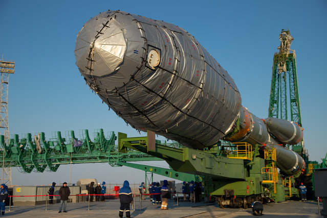 A handout photo made available by Roscosmos press service shows Russian Soyuz-2.1b booster rocket with the Fregat upper stage and the first Arktika-M spacecraft for monitoring climate and environment in the Arctic region is installed on the launch pad at the Baikonur Cosmodrome, Kazakhstan, 25 February 2021. The launch of the Soyuz-2.1b booster rocket with the Fregat upper stage and the Arktika-M spacecraft is scheduled for February 28. (Photo by Roscosmos Press Service/EPA/EFE)