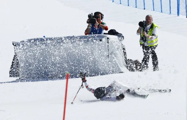 Iran's Atefeh Ahmadi falls during the women's slalom, at the alpine ski World Championships in Cortina d'Ampezzo, Italy, Saturday, February 20, 2021. (Photo by Denis Balibouse/Reuters)