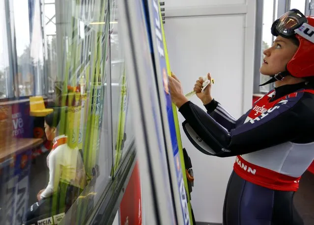 Carina Vogt from Germany prepares for a training session of the women's Individual normal hill HS100 ski jumping at the Nordic World Ski Championships in Falun February 18, 2015. (Photo by Kai Pfaffenbach/Reuters)