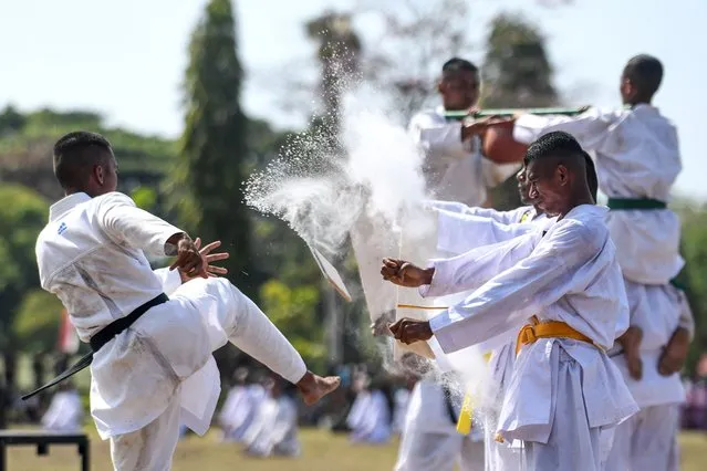 Personnel perform during celebrations marking the 78th anniversary of the Indonesian Armed Forces (TNI) in Dempasar on the resort island of Bali on October 5, 2023. (Photo by Sonny Tumbelaka/AFP Photo)