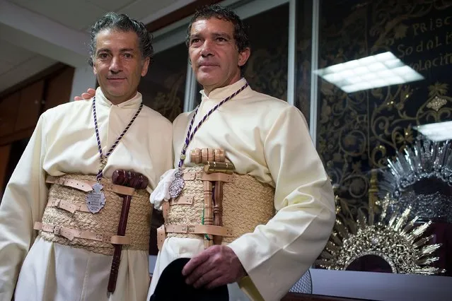 Antonio Banderas (R) and his brother Javier Dominguez Banderas (L) attends the Maria Santisima de Lagrimas y Favores procession at San Juan Bautista church during Holy Week celebrations on March 29, 2015 in Malaga, Spain. (Photo by Gonzalo Arroyo Moreno/Getty Images)