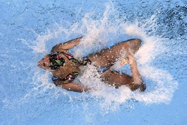 Spain's Mireia Hernandez Luna competes in the preliminary round of the mixed duet free artistic swimming event during the 2024 World Aquatics Championships at Aspire Dome in Doha on February 9, 2024. (Photo by Sebastien Bozon/AFP Photo)