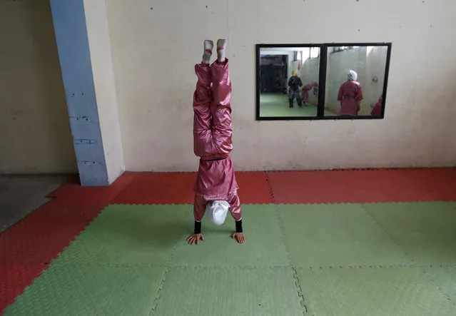 A student of the Shaolin Wushu club practices in Kabul, Afghanistan January 19, 2017. (Photo by Mohammad Ismail/Reuters)