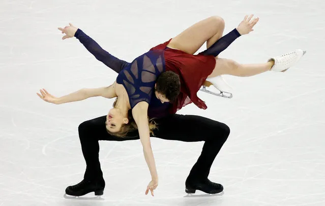 Gabriella Papadakis and Guillaume Cizeron of France perform during the Ice Dance Free Dance competition at the 2016 ISU World Figure Skating Championships at the TD Garden in Boston, Massachusetts, USA, 31 March 2016. The championships are being held from 30 March through 02 April 2016. (Photo by Justin Lane/EPA)
