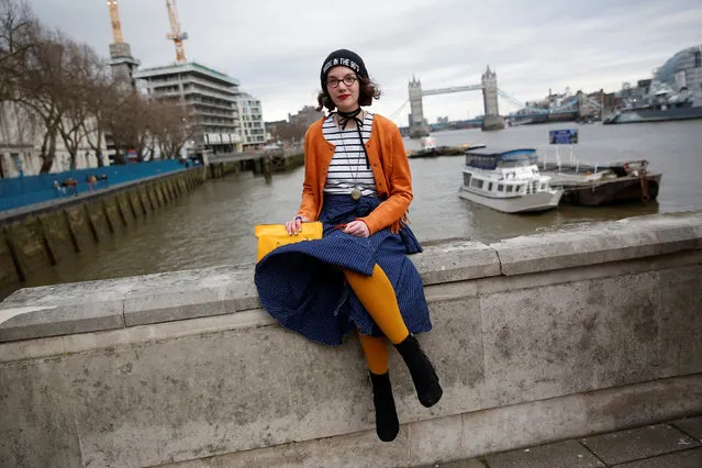 Fashion fan Philippine Ponsar poses for a portrait during London Fashion Week in London, Britain February 19, 2017. (Photo by Neil Hall/Reuters)