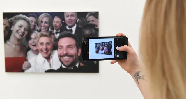 Journalists and guests attend a press view at the Saatchi Gallery for its new exhibition “From Selfie to Self-Expression” on March 30, 2017 in London, United Kingdom. (Photo by Stuart C. Wilson/Getty Images)