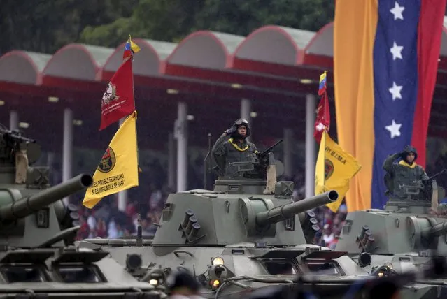 Tanks are displayed during a military parade to celebrate the anniversary of Venezuela's independence in Caracas, July 5, 2015. (Photo by Jorge Dan Lopez/Reuters)