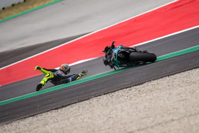 Valentino Rossi of Italy and Petronas Yamaha SRT and bis motorcycle slide over the run-off zone after his crash during the MotoGP Gran Premi Monster Energy de Catalunya at Circuit de Barcelona-Catalunya on June 06, 2021 in Barcelona, Spain. (Photo by Steve Wobser/Getty Images)