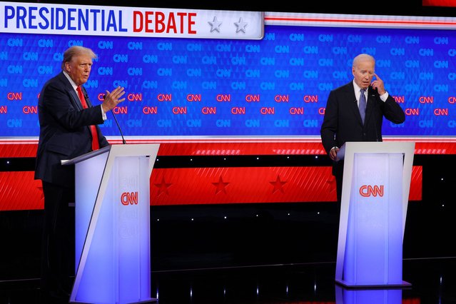 President Joe Biden speaks during a presidential debate with former President Donald Trump in Atlanta, Georgia, on June 27, 2024. Each suggested the other was a criminal. “The only person on this stage who is a convicted felon is the man I'm looking at right now”, Biden said and then accused Trump of having s*x with p*rn star Stormy Daniels. (Photo by Brian Snyder/Reuters)