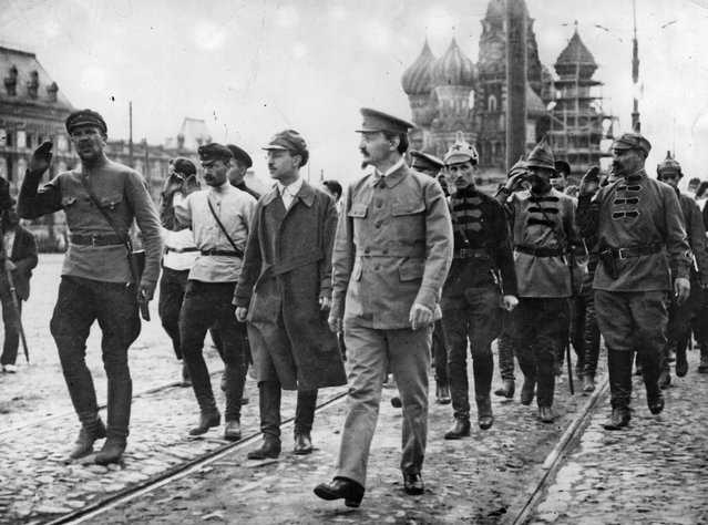 Leon Trotsky (1879 – 1940) reviews the Red Band in Moscow, 1921. (Photo by Topical Press Agency/Getty Images)