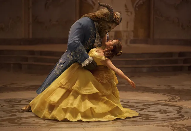 This image released by Disney shows Dan Stevens as The Beast, left, and Emma Watson as Belle in a live-action adaptation of the animated classic “Beauty and the Beast”. Disney’s film Beauty and the Beast has been pulled from cinemas in Kuwait after the country’s censors raised concerns over the film’s content. Duaij Al-Khalifa Al-Sabah, a board member at the National Cinema Company that operates 11 of Kuwait’s 13 movie theaters, told The Associated Press on Monday, March 20, 2017 a newly edited version of the movie may be back in theaters later this week. (Photo by Disney via AP Photo)