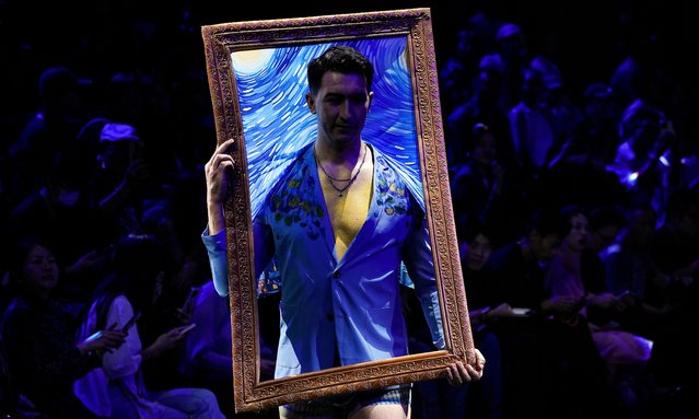 A model showcases a creation by Roma Century catwalks on stage during the SS25 China Fashion Week in Beijing, Tuesday, September 10, 2024. (Photo by Andy Wong/AP Photo)