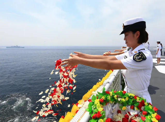 Chinese navy holds memorial ceremony for 120th anniversary of the first Sino-Japanese War on August 27, 2014 in Weihai, Shandong province of China. The First Sino-Japanese War was fought from August 1, 1894 to April 17, 1895. (Photo by ChinaFotoPress/ChinaFotoPress via Getty Images)
