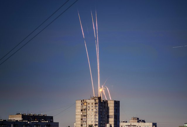 Russian rockets launched against Ukraine from Russia's Belgorod region are seen at dawn in Kharkiv, Ukraine, early Friday, September 9, 2022. (Photo by Vadim Belikov/AP Photo)