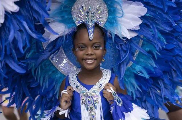 Performers process down the route during the Notting Hill carnival on August 28, 2022 in London, England. The Caribbean carnival returns to the streets of Notting Hill after a two-year hiatus due to the Covid pandemic. (Photo by Dan Kitwood/Getty Images)