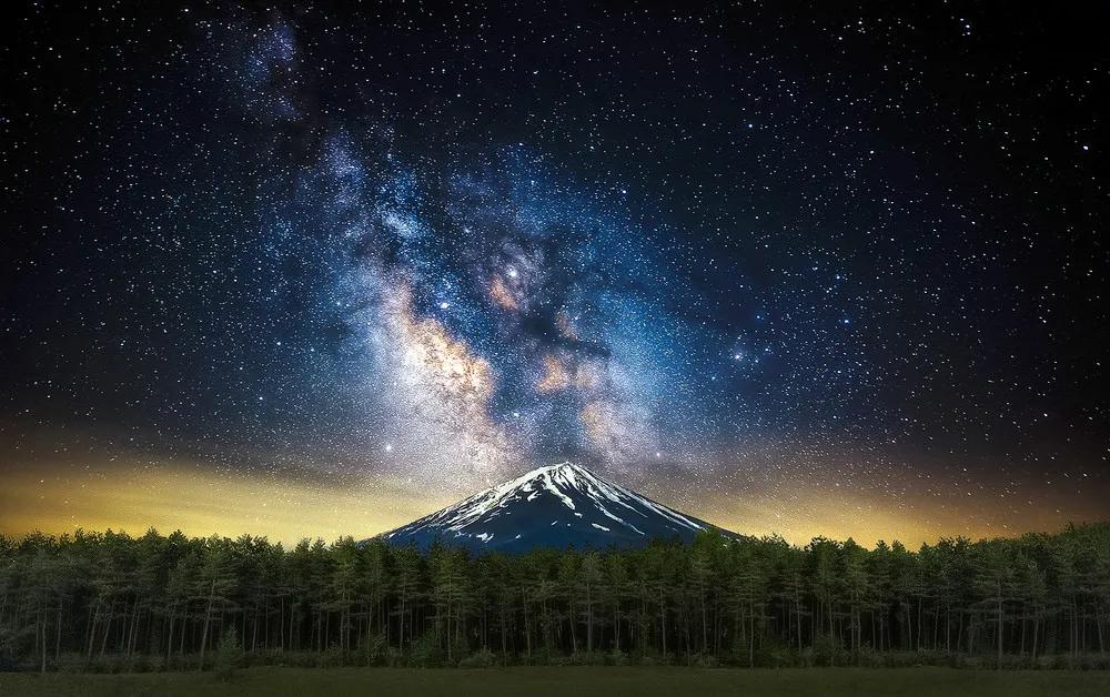 Milky Way shining down on Mount Fuji