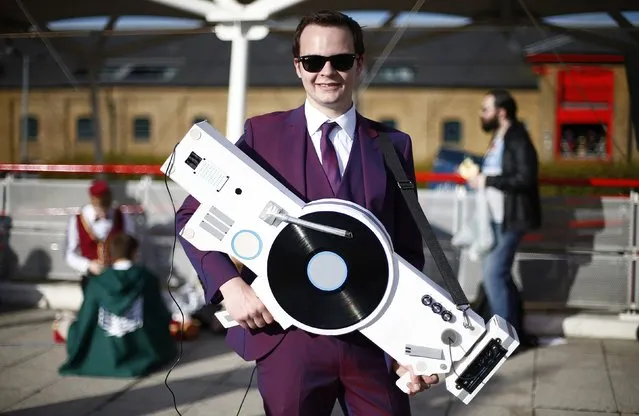 Jake Douglas poses as “The Boss” from the game Saints Row IV outside the MCM Comic Con at the Excel Centre in East London, October 25, 2014. (Photo by Andrew Winning/Reuters)