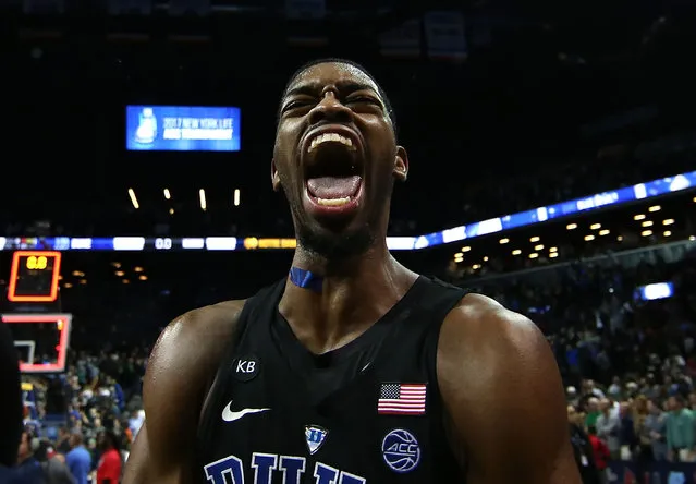 Amile Jefferson #21 of the Duke Blue Devils celebrates their 75-69 win over the Notre Dame Fighting Irish in the championship game of the 2017 Men's ACC Basketball Tournament at the Barclays Center on March 11, 2017 in New York City. (Photo by Al Bello/Getty Images)