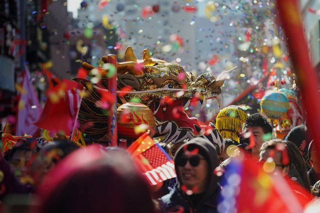 A dragon head is seen during the Lunar New Year parade celebrating the Year of the Dragon in the Chinatown neighborhood of New York, U.S., February 25, 2024. (Photo by Bing Guan/Reuters)