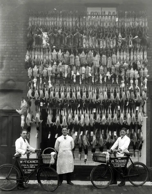 A Christmas display outside the premises of W Tickner Fish and Poultry sales in St Thomas Street, Derby, UK taken sometime before the first world war. (Photo by W.W. Winter/The Guardian)