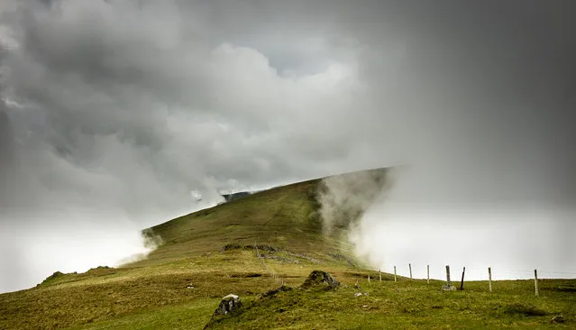 Cloud tunnel, Carneddau, north Wales by Steve M. Smith. “Barometric pressure was high, clear weather was forecast. On the hills we were shrouded until late morning when a clear way emerged along the ridge towards Foel Fras in the Carneddau”. (Photo by Steve M. Smith/Weather Photographer of the Year 2016)