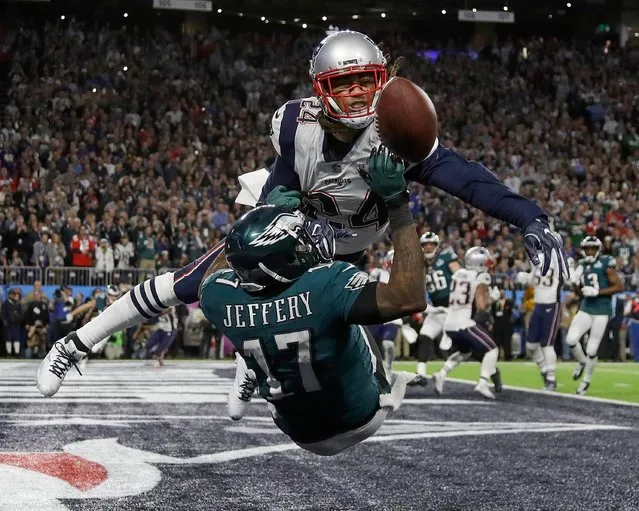 New England Patriots' Stephon Gilmore, top, breaks up a pass intended for Philadelphia Eagles' Alshon Jeffery during the first half of the NFL Super Bowl 52 football game Sunday, February 4, 2018, in Minneapolis. (Photo by Matt Slocum/AP Photo)