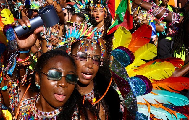 Revellers take part in the Notting Hill Carnival in London, Britain, on August 25, 2025. (Photo by Jack Taylor/Reuters)