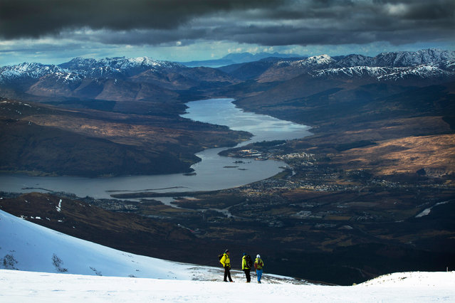 Walkers look down to Fort William, Corpach and Loch Eil from Aonach Mor, Scotland situated in the shadows of Ben Nevis. (Photo by Murdo Macleod for the Guardian)