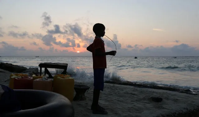 A Somali boy stands at the shores of the Indian Ocean on Liido beach, in Mogadishu, Somalia November 4, 2016. (Photo by Feisal Omar/Reuters)
