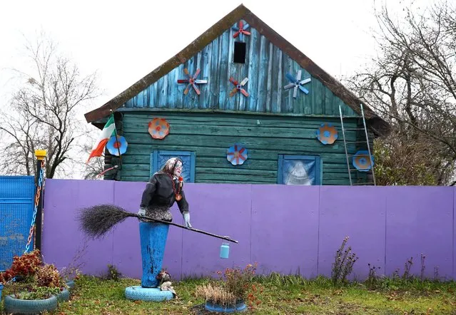 An installation with Baba Yaga, the Witch, an old woman from Russian fairy tales is seen at a villager's house in the village of Vits, Belarus November 8, 2016. (Photo by Vasily Fedosenko/Reuters)
