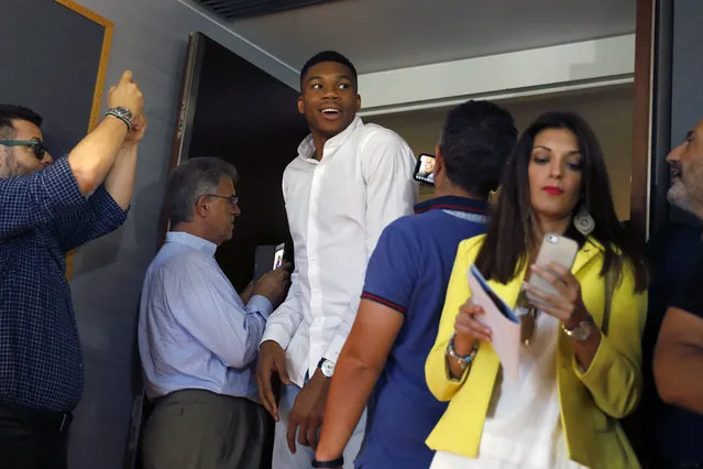 NBA star Giannis Antetokounmpo arrives to a press conference by Greece's Tourism Ministry to promote his native Greece, in Athens, on Friday, June 29, 2018. Antetokounmpo, whose parents immigrated to Greece from Nigeria, said he always encourages his friends to visit but his favorite part of the country is Athens, where he grew up. (Photo by Petros Giannakouris/AP Photo)