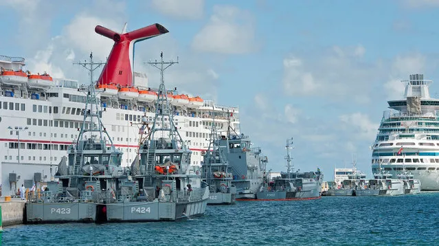 Royal Bahamas Defence Force vessels take refuge from Hurricane Matthew at the U.S. Navy's Truman Harbor pier in Key West, Florida, October 5, 2016. (Photo by Rob O'Neal/Reuters/Florida Keys News Bureau)