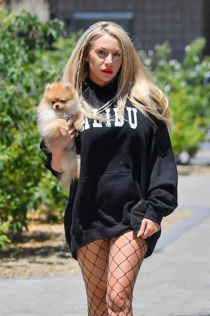 American media personality Courtney Stodden makes a coffee run with her puppy Coco and her boyfriend Chris in Palm Springs on May 17, 2021. Courtney recently called out Chrissy Teigen for a series of vile tweets which has resulted in Chrissy cookware line being dropped by Macy. (Photo by Snorlax/The Mega Agency)