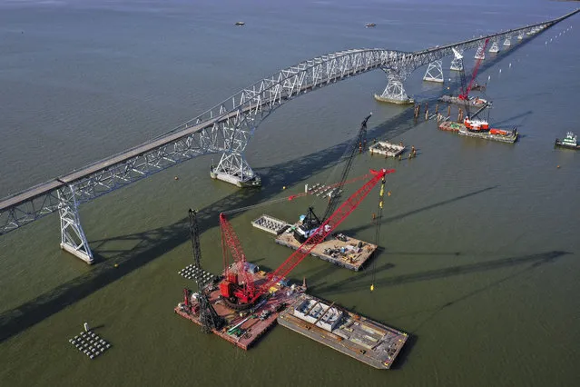 In an aerial view, construction continues on a new $463 million Nice/Middleton Bridge on April 8, 2021 in Newburg, Maryland. The bridge will replace the current Governor Harry W. Nice Memorial Bridge, which links Newburg, Maryland to Dahlgren, Virginia on U.S. Route 301 across the Potomac River. Led by the Maryland Transportation Authority, the new bridge will double the vehicle capacity, improve safety and allow tall ships to pass beneath its 135-foot clearance. At the end of March, President Joe Biden introduced a $2.3 trillion plan to overhaul and upgrade the nations infrastructure. The plan aims to revitalize the U.S. transportation infrastructure, water systems, broadband internet, make investments in manufacturing and job training efforts, and other goals. (Photo by Drew Angerer/Getty Images)