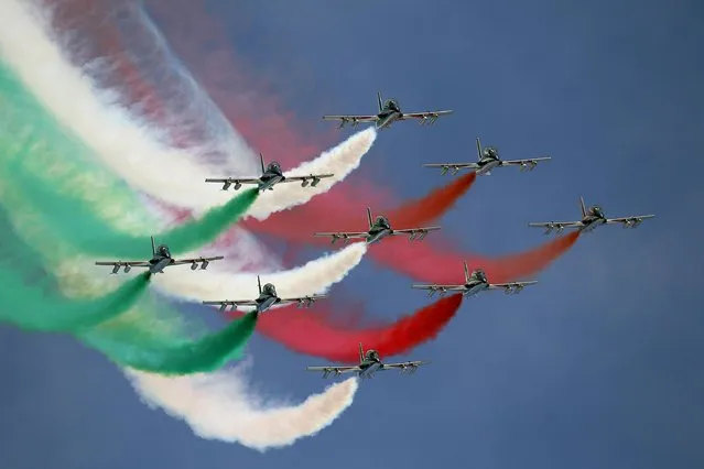 Italian Airforce Frecce Tricolori acrobatic team perform before the start of second run of a men's World Cup Giant Slalom, in Alta Badia, Italy, Sunday, December 16, 2018. (Photo by Andrea Solero/ANSA via AP Photo)