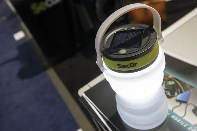 The collapsible solar powered bottle lantern produced by Secur, a unit of Maverick Industries Inc., is arranged for a photograph during the 2017 Consumer Electronics Show (CES) in Las Vegas, Nevada, U.S., on Thursday, January 5, 2017. (Photo by Patrick T. Fallon/Bloomberg)