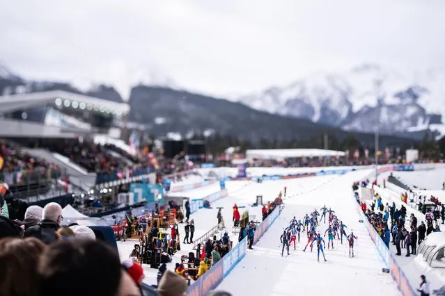 A picture taken with a tilt-shift lens shows athletes in action during the start of the men's 4x7,5km Pursuit race at the IBU Biathlon World Cup in Hochfilzen, Austria, 10 December 2023. (Photo by Christian Bruna/EPA)