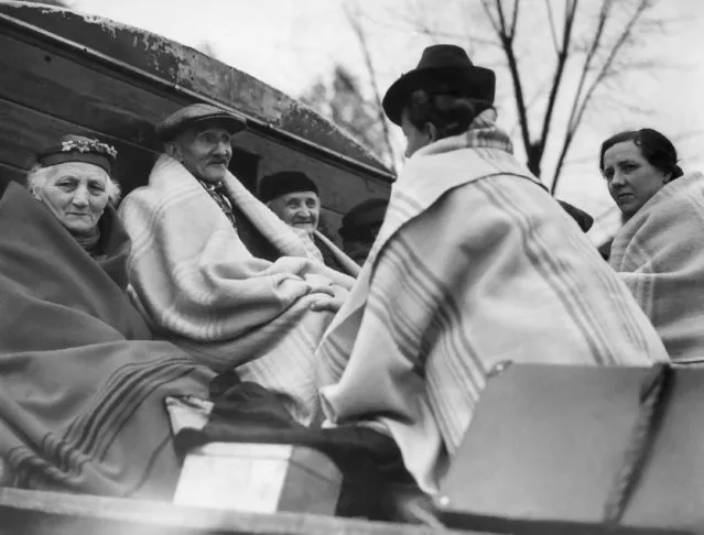 Belgian civilians, wrapped in blankets, are being evacuated after their homes had been bombed by German airmen, May 17, 1940. (Photo by AP Photo)